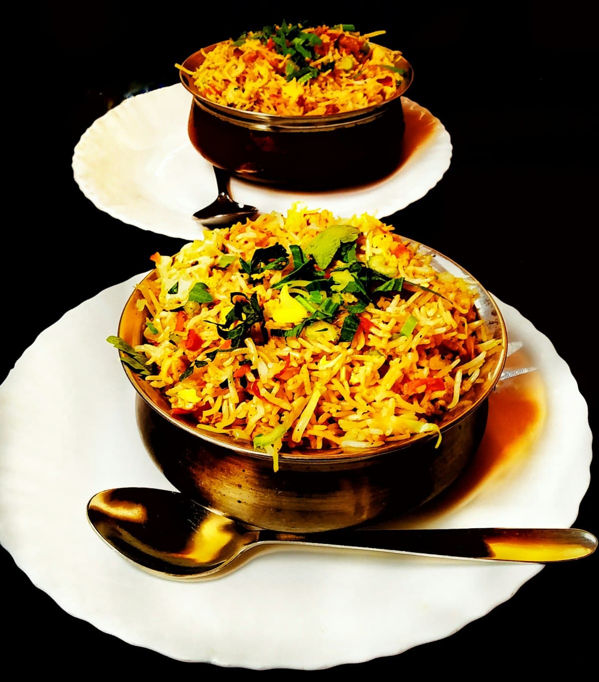 Fragrant chicken biryani served with raita